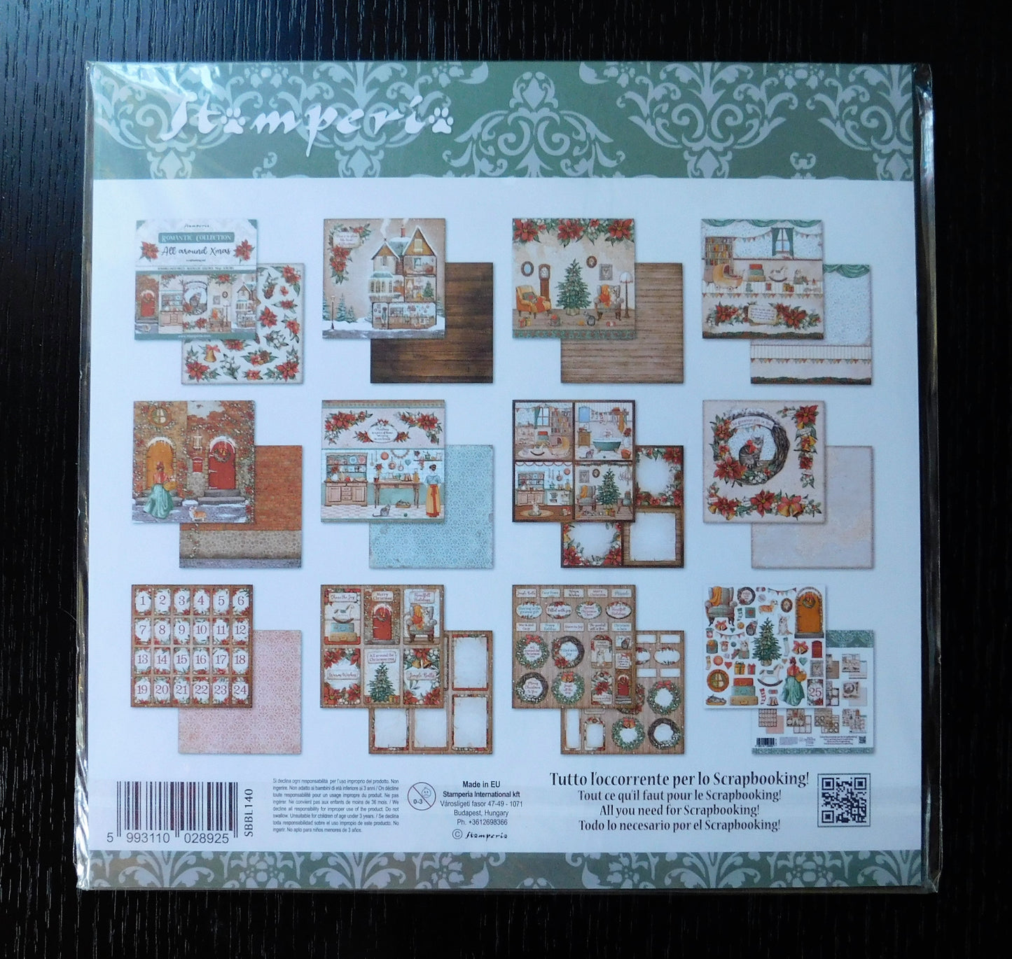 Packaging of Stamperia paper sheets with decorative designs on a dark surface