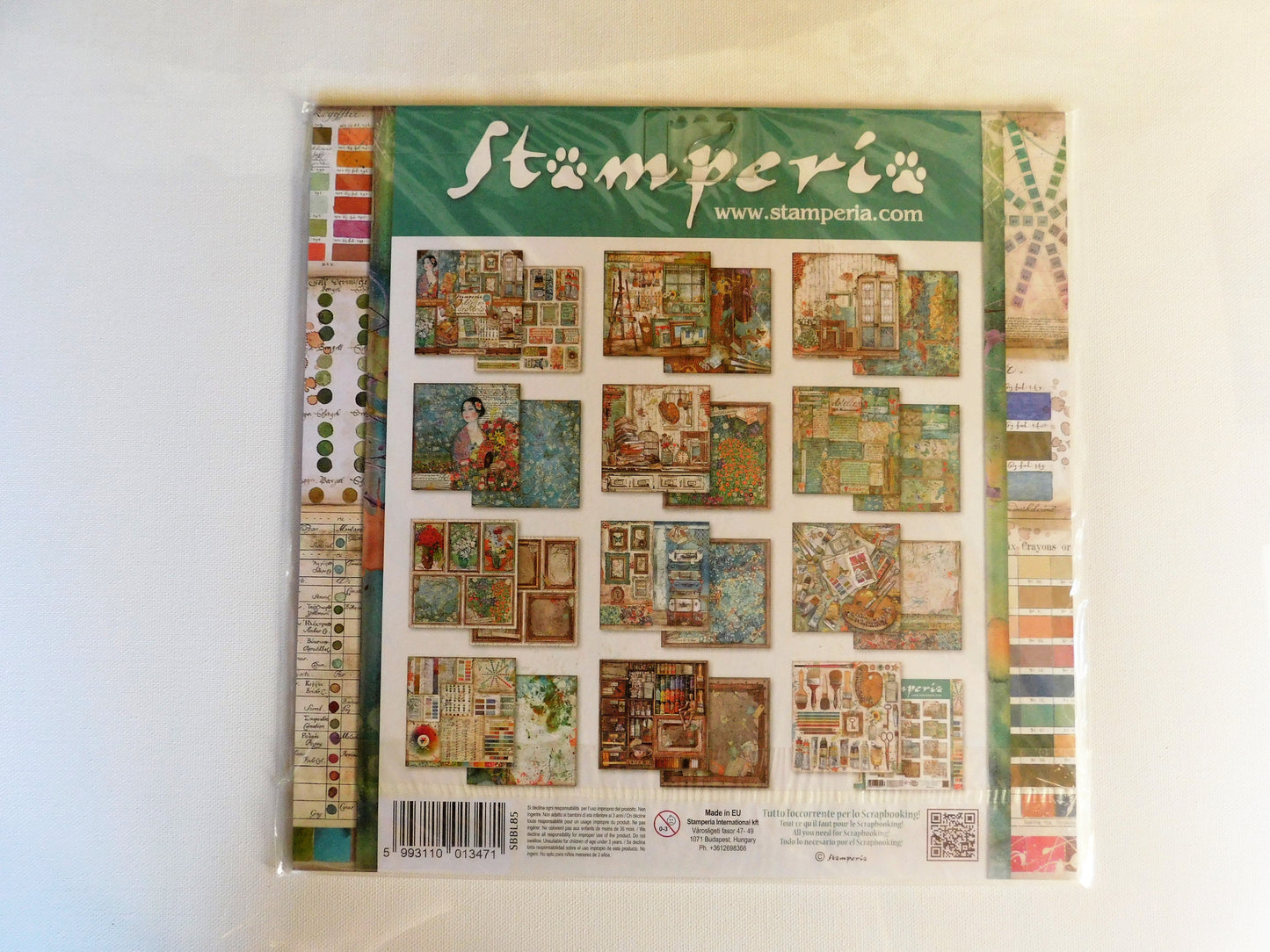A packaged stamp collection sheet from Stamperia, showing a grid of various vintage-style illustrated stamps and patterned borders on a white background.