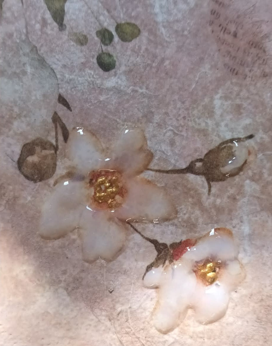 Floral detail on a textured surface