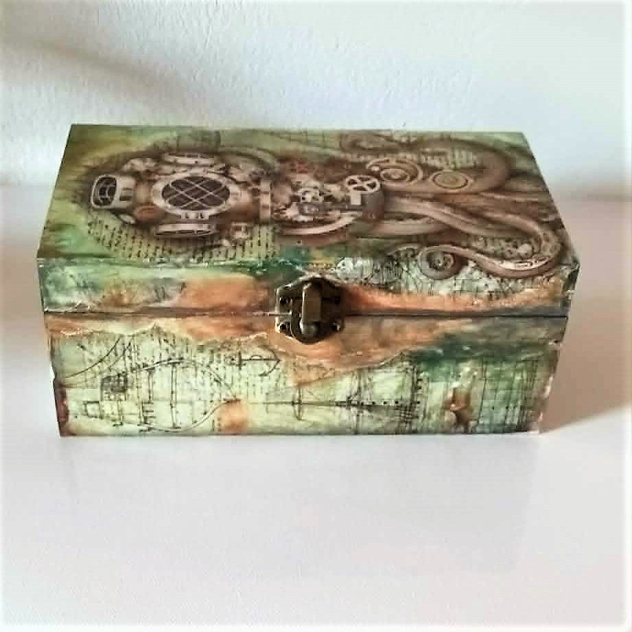 vintage hand crafted wooden box with a diver on the top lid