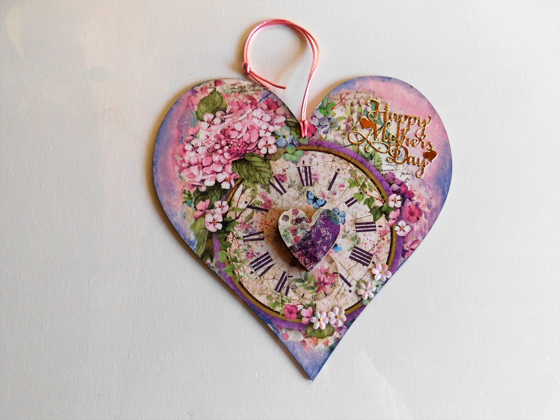 Heart-shaped wooden card with floral design and 'Happy Mother's Day'  