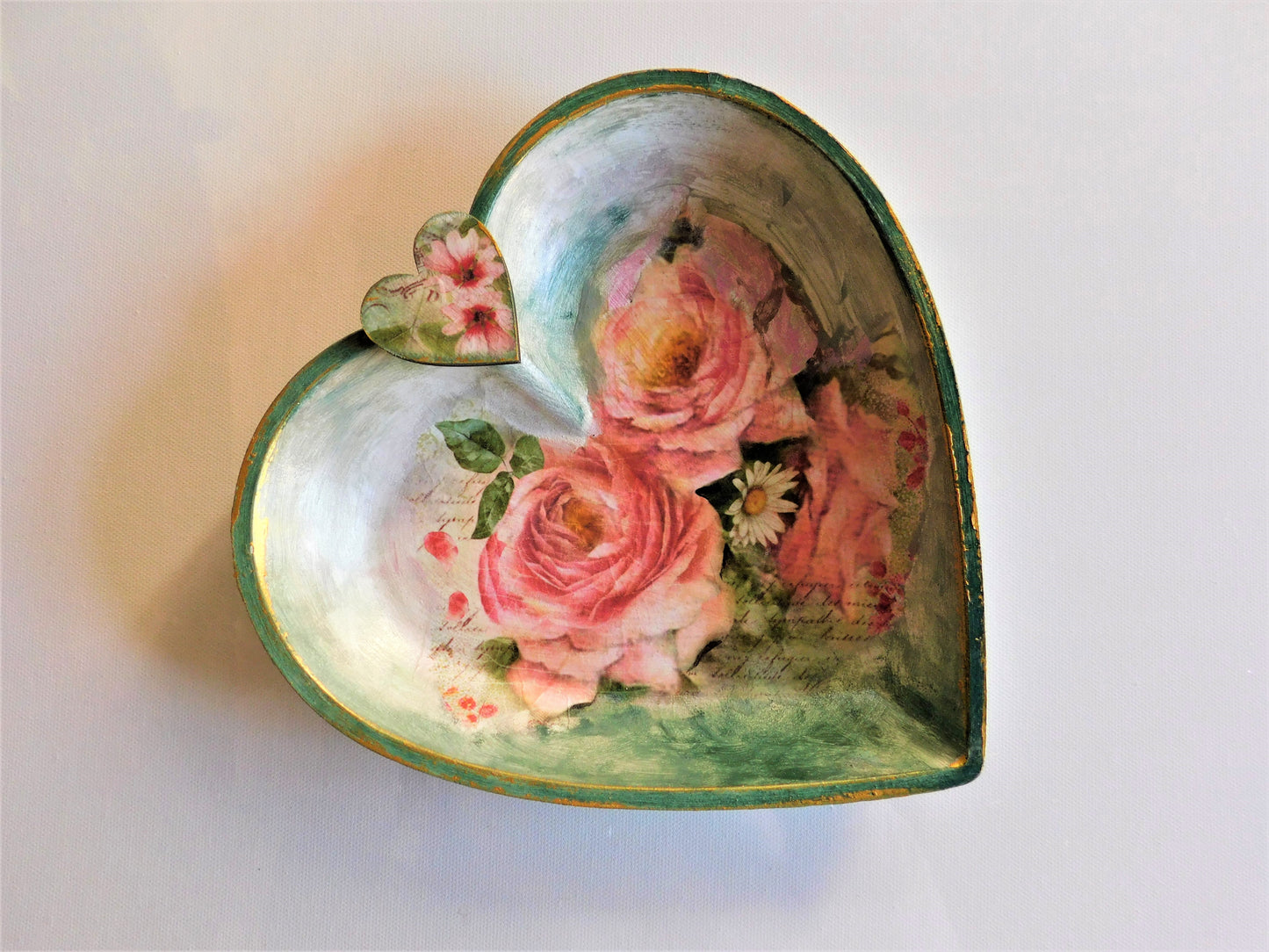 Heart-shaped wooden dish decorated with decoupage technique 