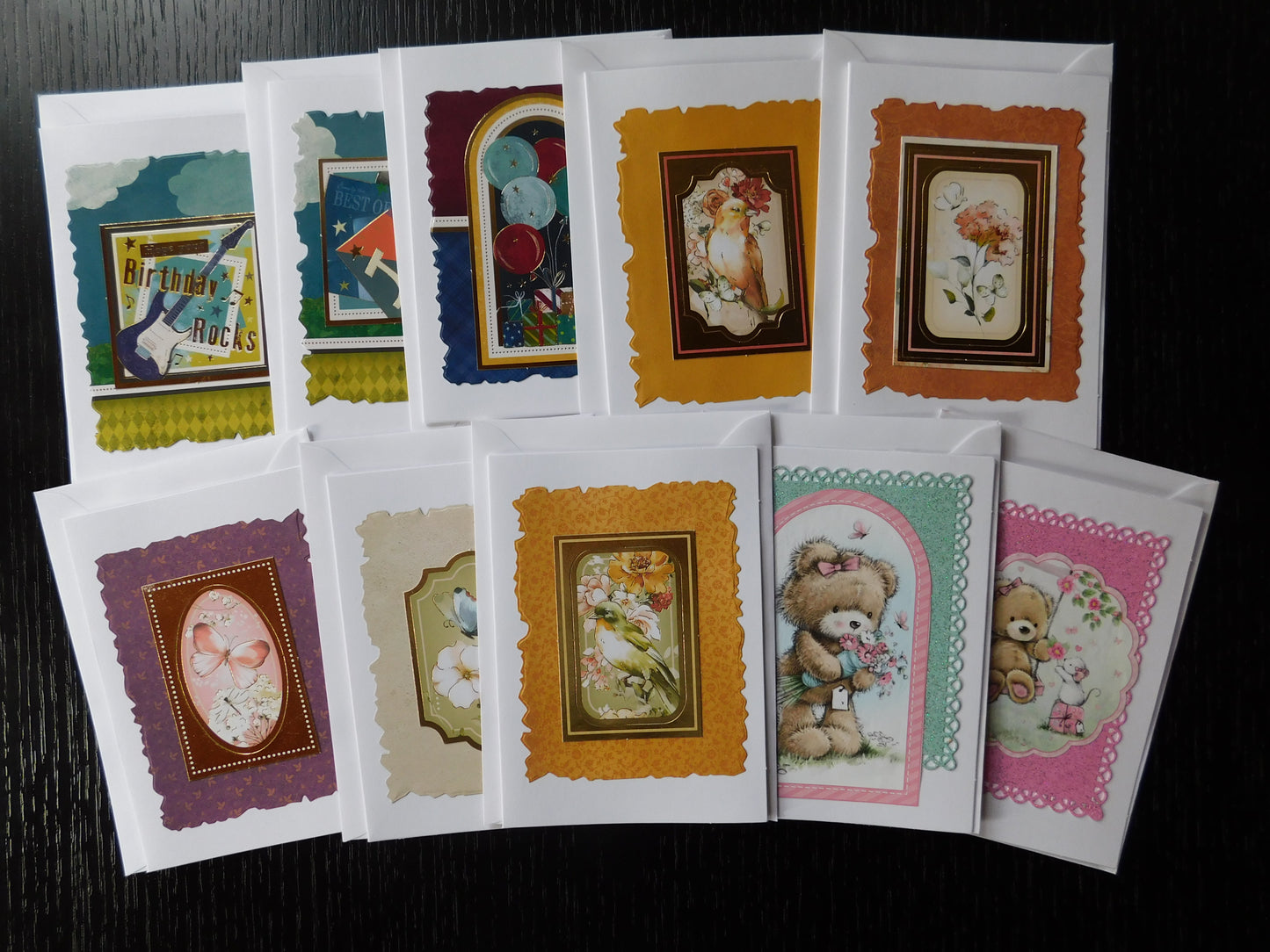 Collection of various greeting cards with different designs 