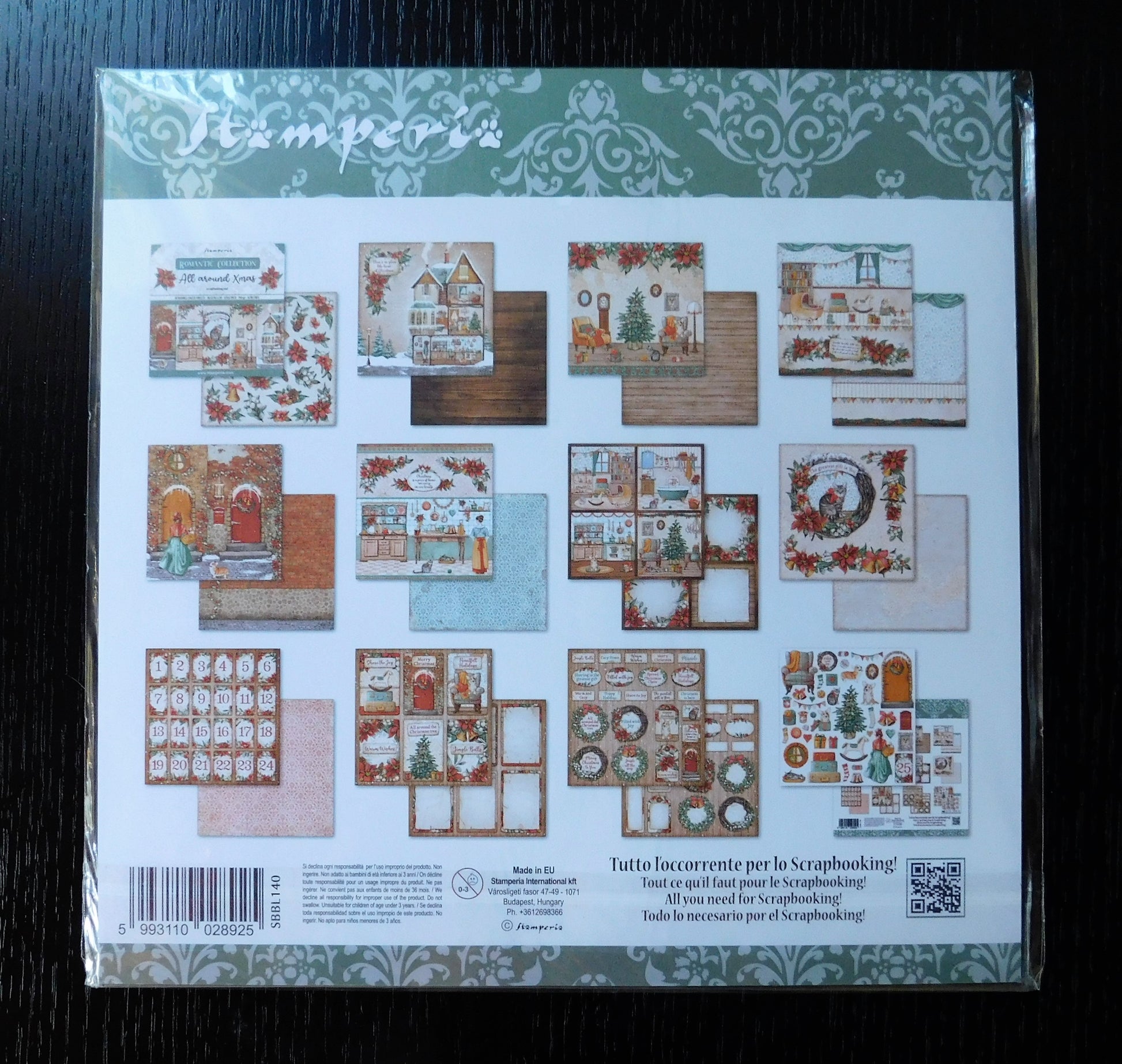 Packaging of Stamperia paper sheets with decorative designs on a dark surface