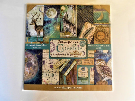 A square scrapbooking paper sheet set titled 'Stamperia Cosmos' with a collage of vintage-style illustrated panels, including a deer, wolf, owl, moon, compass, and script elements.
