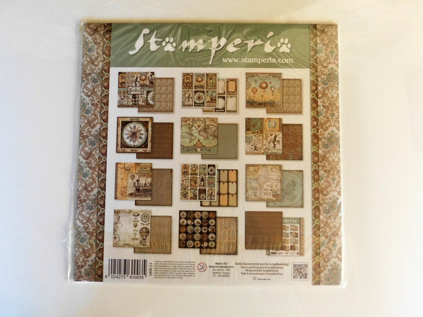 A packaged scrapbooking paper from Stamperia, featuring a collage of vintage-style scrapbook paper designs.