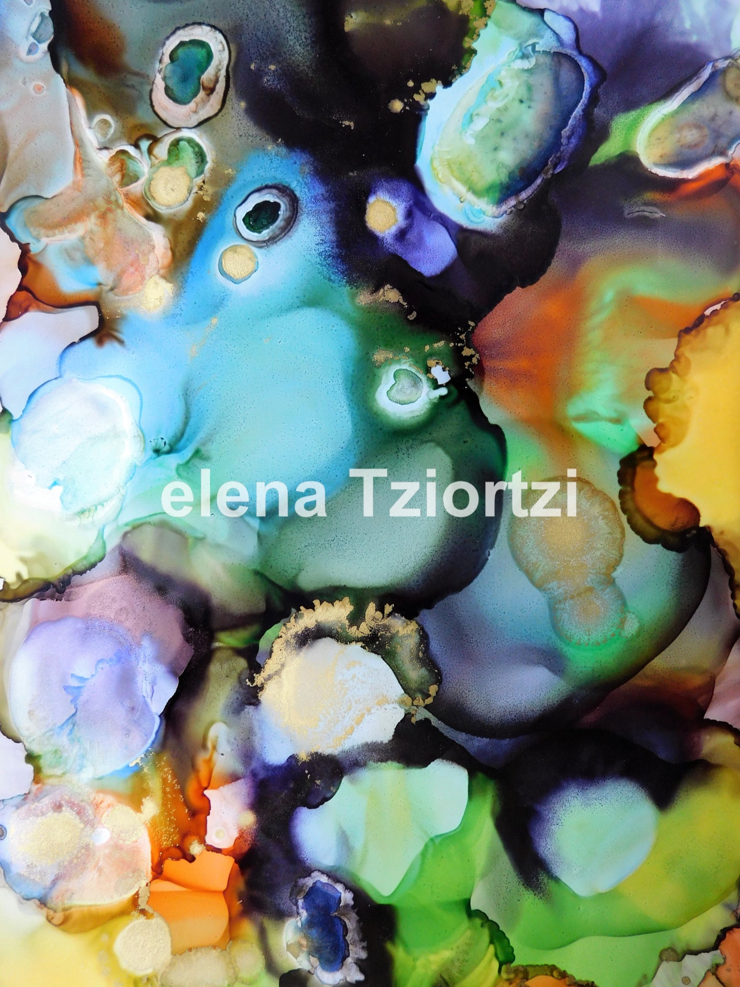 small abstract artwork with a blue butterfly